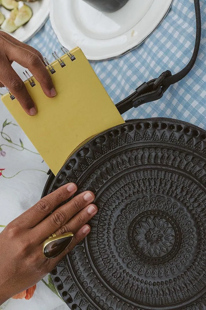 Embossed Circle Crossbody
