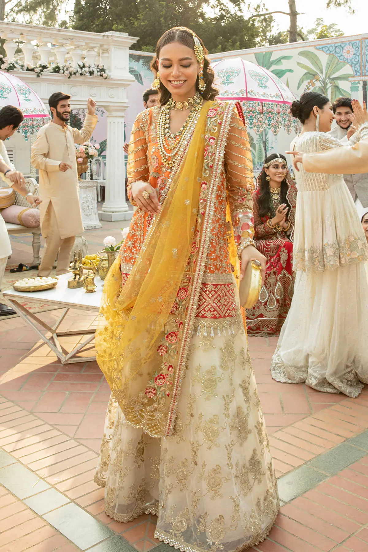 Traditional Heavily Embellished Yellow Pakistani Kameez Salwar Suit